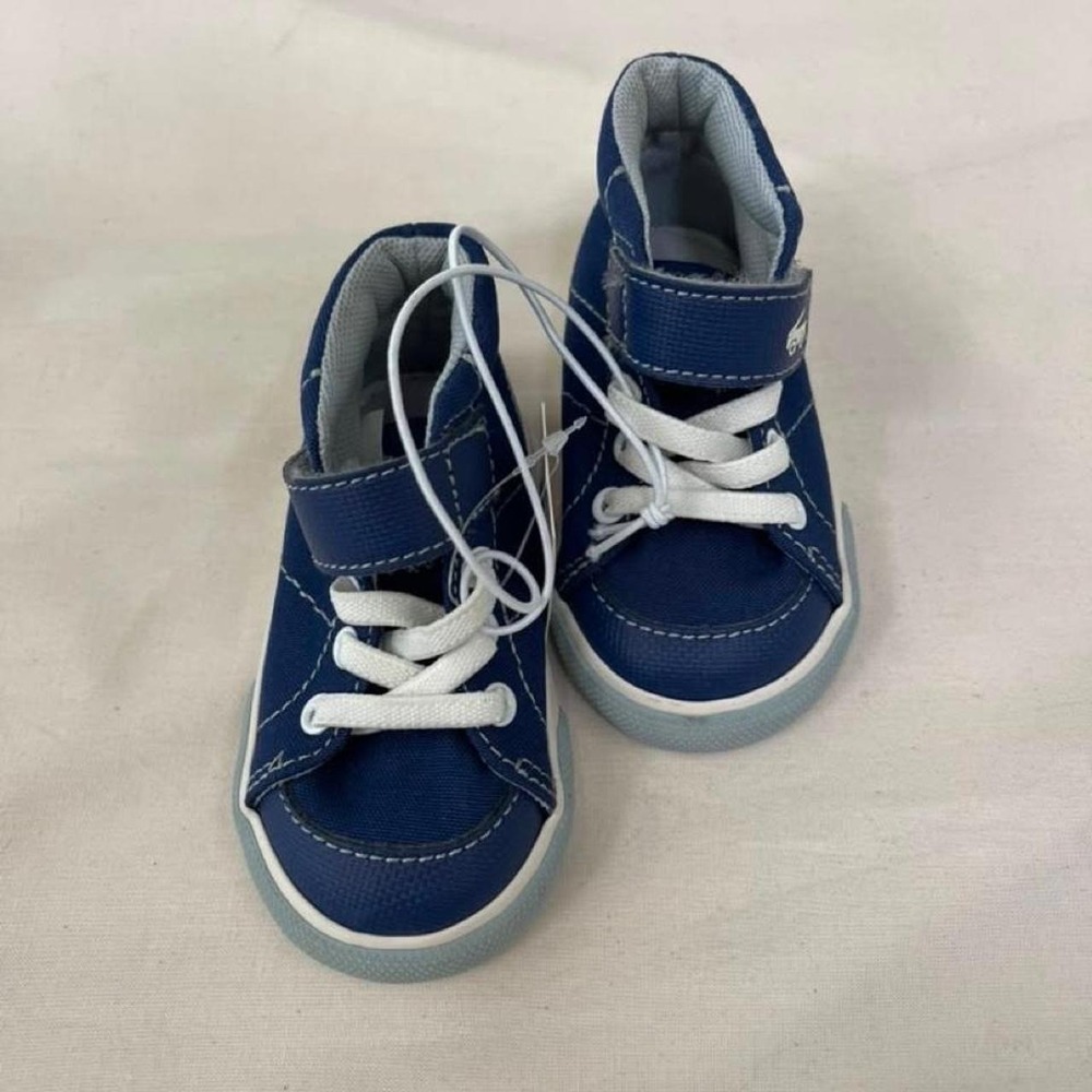 Blue kids sneakers with white stitching, size 4